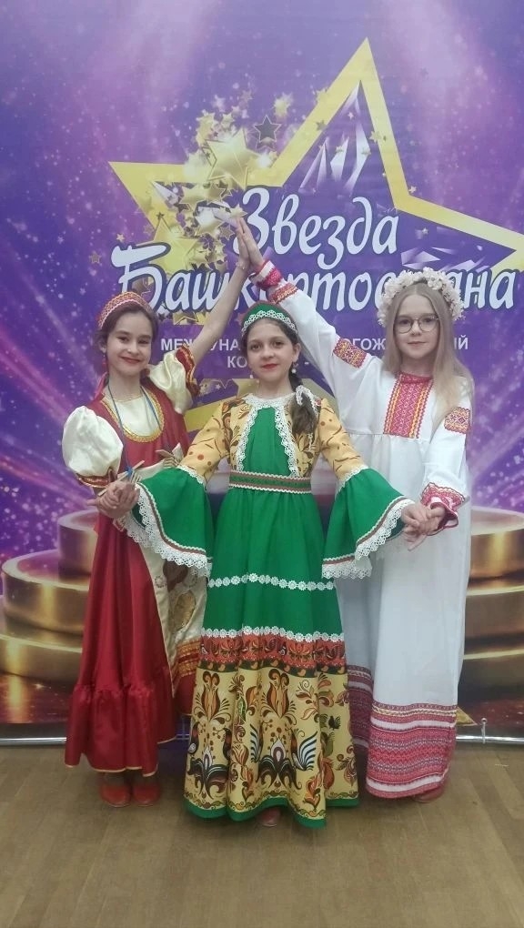 Фото из заметки о победе на вокальном конкурсе с песней композитора Алексея Ольханского