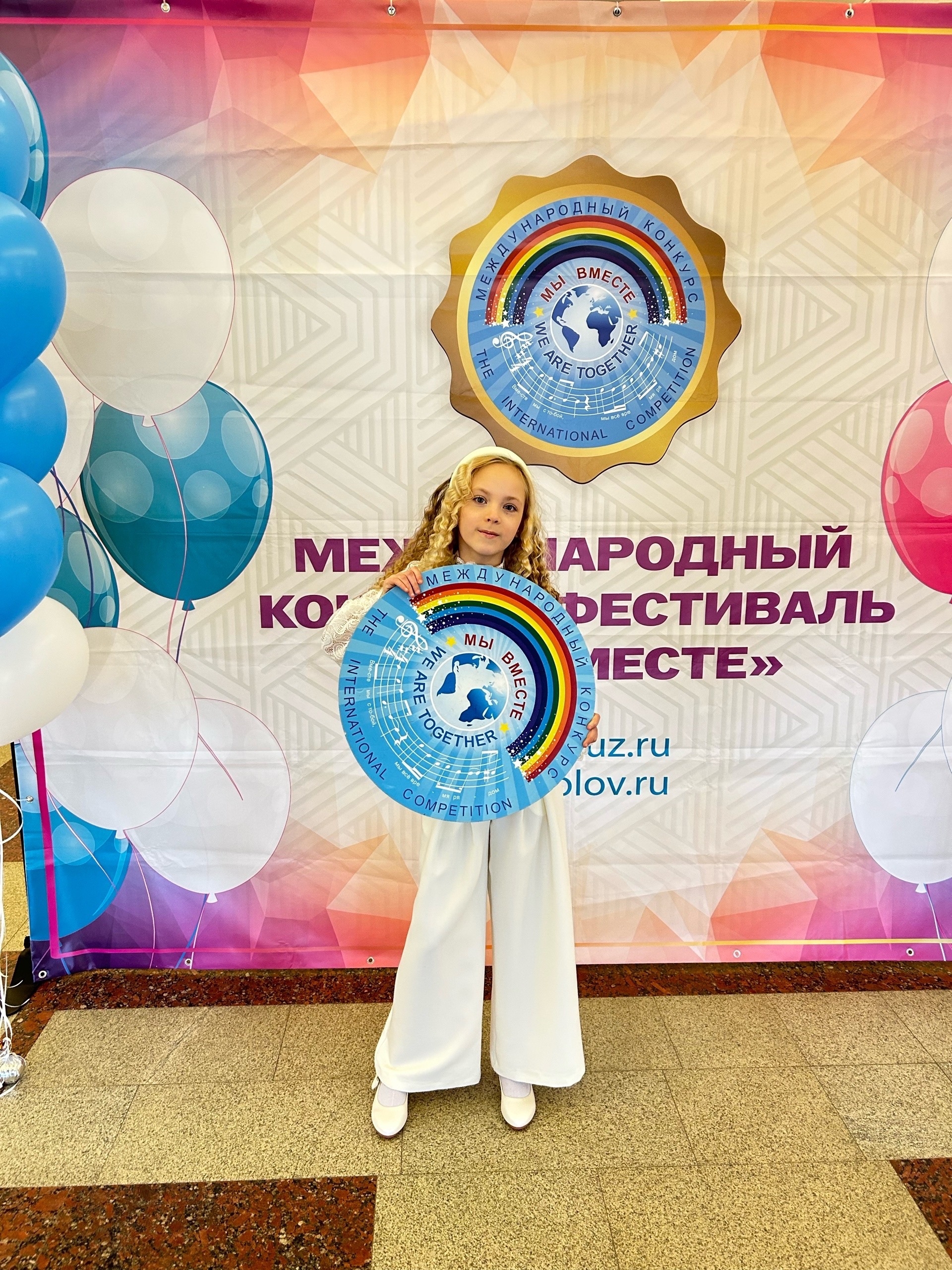 Фото из заметки о победе на вокальном конкурсе с песней композитора Алексея Ольханского