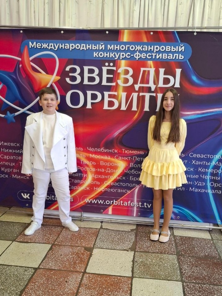 Фото из заметки о победе на вокальном конкурсе с песней композитора Алексея Ольханского